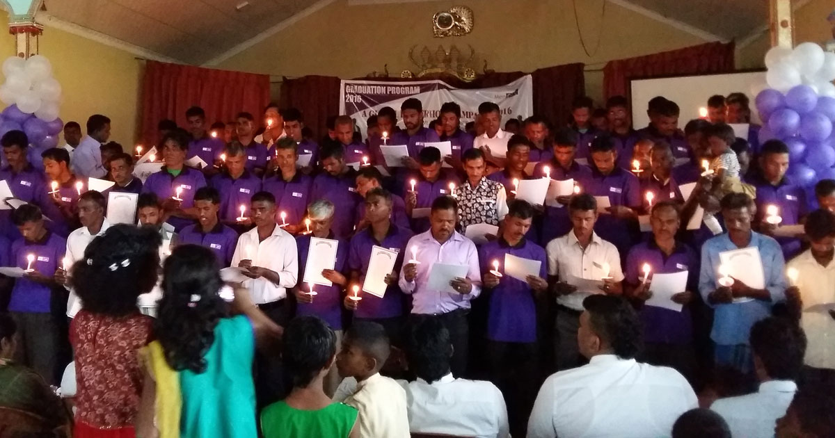 Fathers from the Nuwara Eliya Area ADP read an oath at their graduation from MenCare.