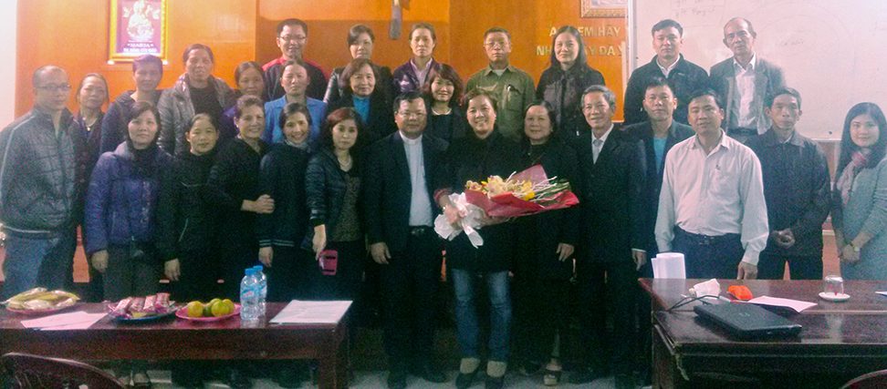 Religious leaders in Hanoi pose in a group photo after completing a training with CSAGA.