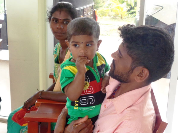 A young family participates in the MenCare program.